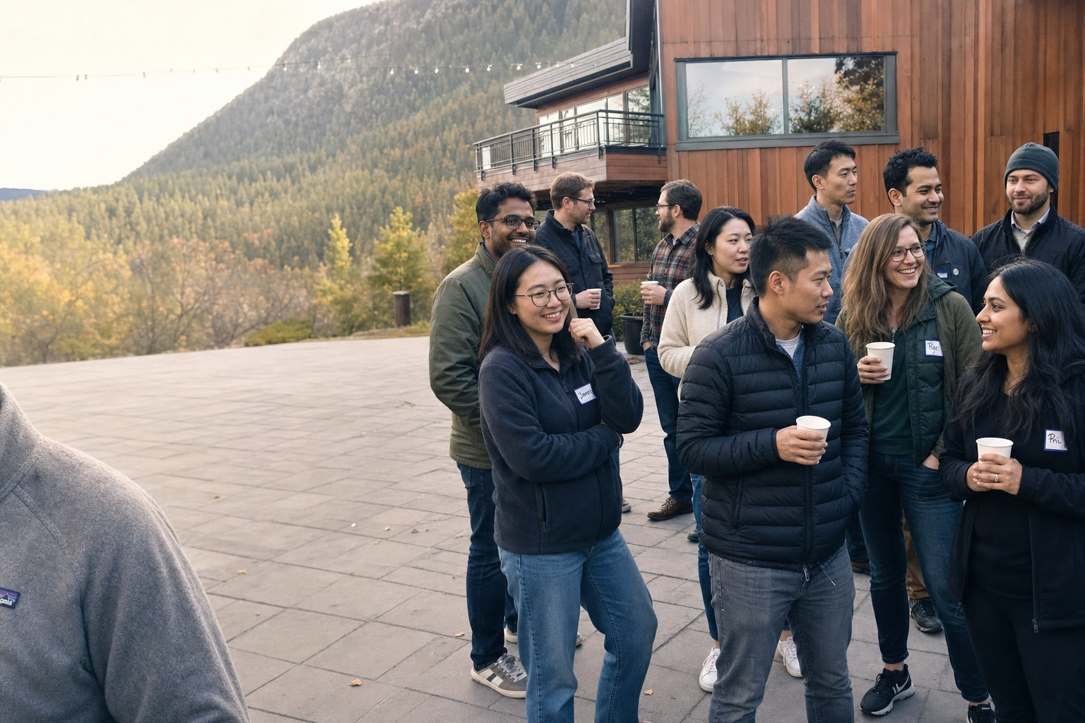Lab-Δ team Q4 2025 retreat — confidential. Front row, left to right: Qihang Wang, Lan Lin, [REDACTED], Ethan Knight.